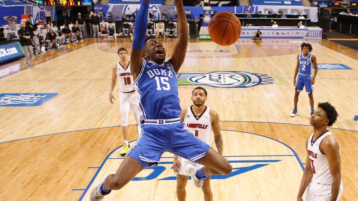 Duke’s Mark Williams (15) slams in two during Duke’s 70-56 victory over Louisville in the second round of the ACC Men’s Basketball Tournament in Greensboro, N.C., Wednesday, March 10, 2021.