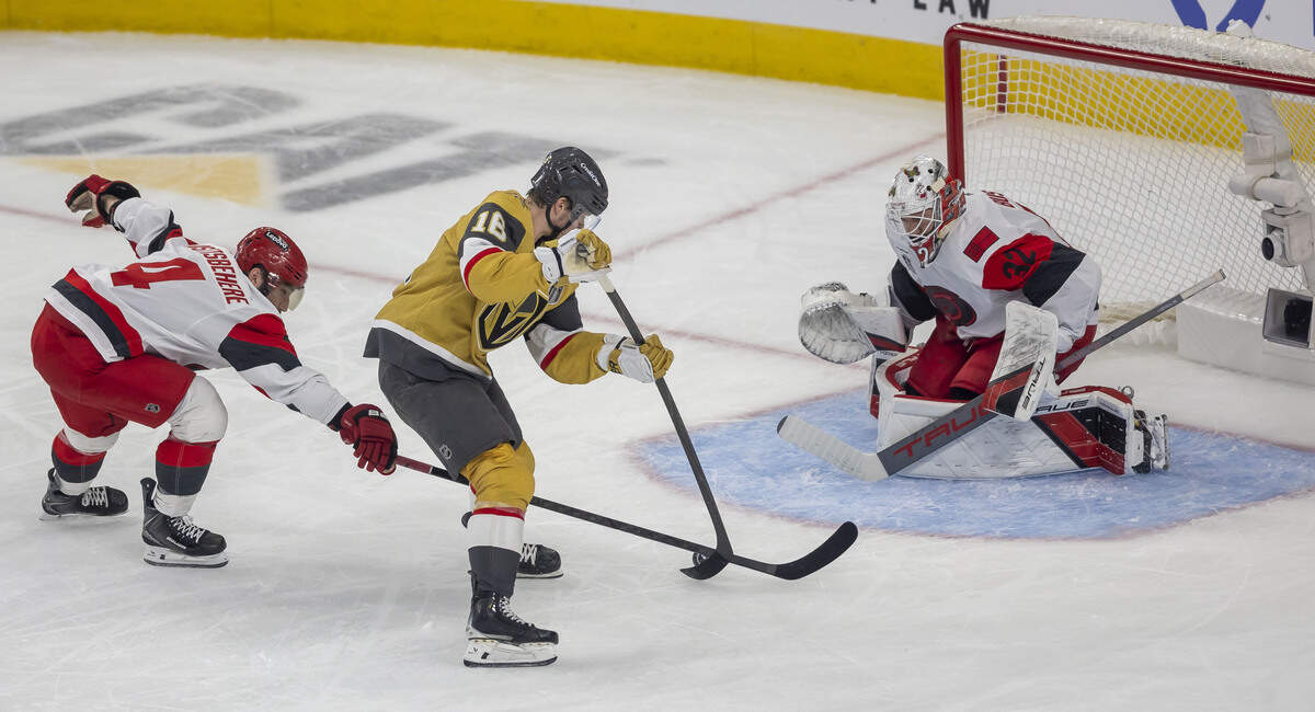 Carolina Hurricanes defenseman Shayne Gostisbehere (4), prevents Vegas right wing Pavel Dorofeyev (16) from shooting on Carolina Hurricanes goalie Brandon Bussi (32), in the first period, in Game 4 of the Stanley Cup Final, on Tuesday, June 9, 2026 in Las Vegas, NV.