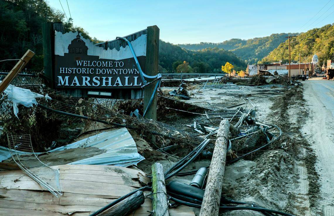 The small town of Marshall, about 15 miles northwest of Asheville, was among Western North Carolina’s most devastated places during the Hurricane Helene. The storm flooded every downtown building and left a trail of debris and wreckage including the welcome sign at the edge of town.
