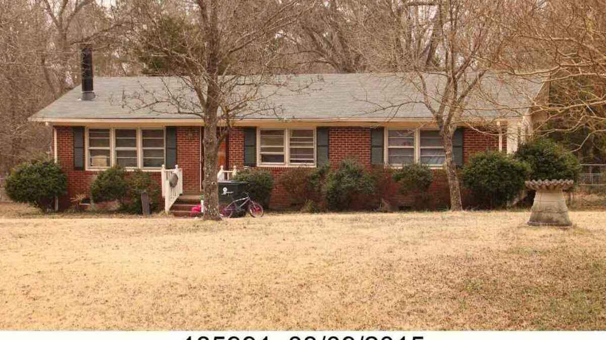 1908 Torredge Road, Durham, NC, where a person was found dead Thursday night, April 26, 2018, after an apparent home invasion. Durham County sheriff's deputies said they had one person in custody after searching the area around the house.
