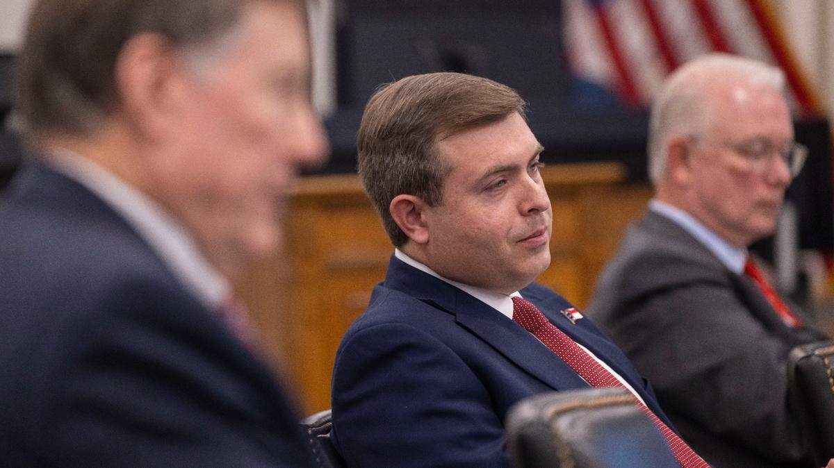 North Carolina Labor Commissioner Luke Farley, center, listens to discussion during the Council of State meeting on Tuesday, February, 4, 2025 in Raleigh, N.C.