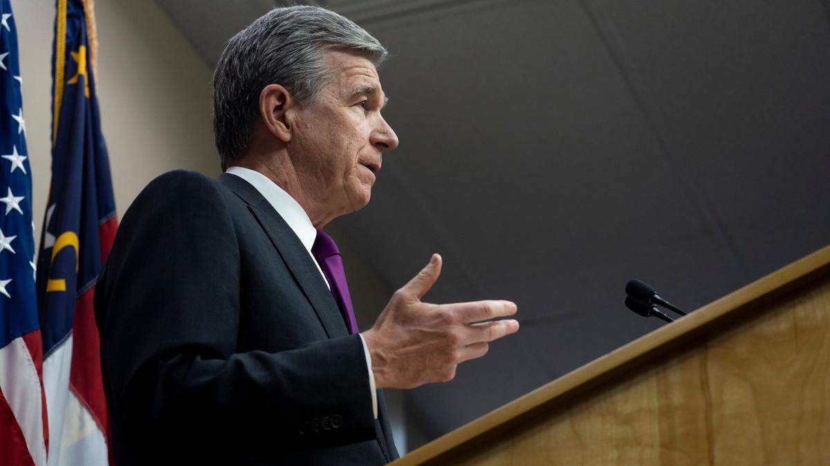 Gov. Roy Cooper speaks at a press conference in the N.C. Department of Administration Press Room in Raleigh, N.C. on Wednesday, May 11, 2022.