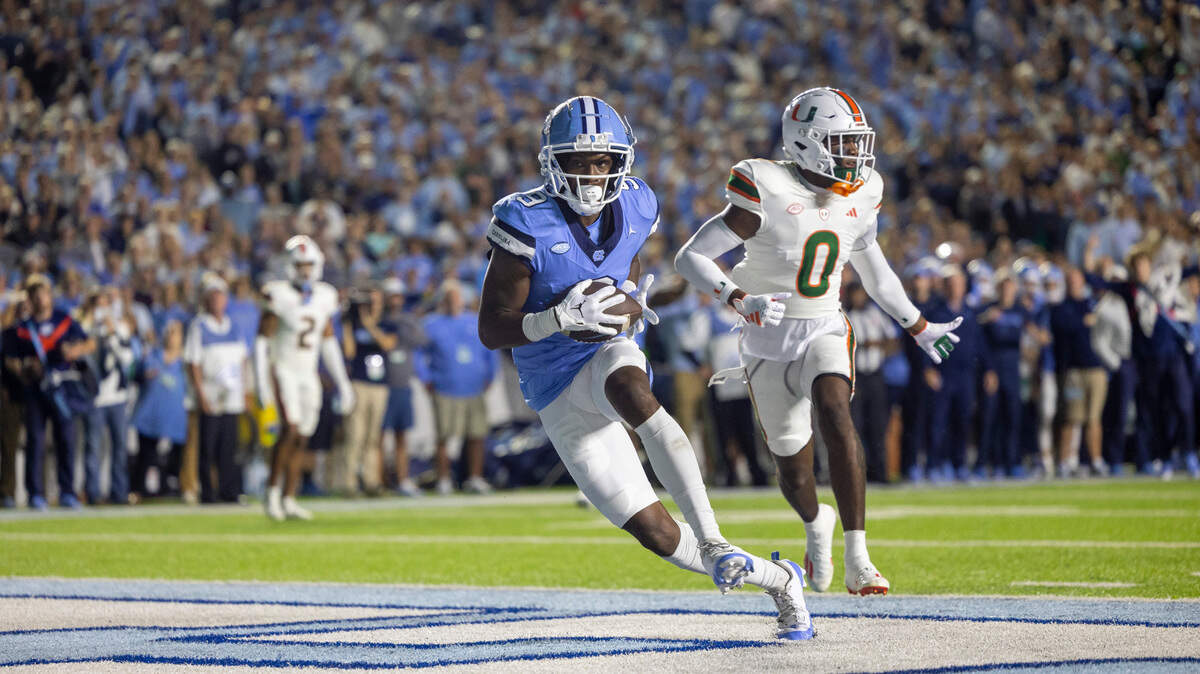 North Carolina wide receiver Devontez Walker (9) scores on an 18-yard pass completion from quarterback Drake Maye to give the Tar Heels a 7-0 lead in the first quarter on Saturday, October 14, 2023 at Kenan Stadium in Chapel Hill, N.C.