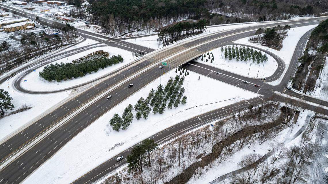 Traffic is light during morning rush hour South Saunders Street in Raleigh on Thursday, Feb. 20, 2025. Several inches of snow fell in the area on Wednesday with temperatures dipping to 25 degrees.