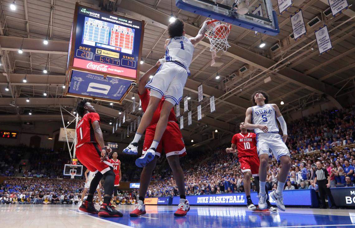 Duke’s Dereck Lively II (1) slams in two during Duke’s 71-67 victory over N.C. State at Cameron Indoor Stadium in Durham, N.C., Tuesday, Feb. 28, 2023.