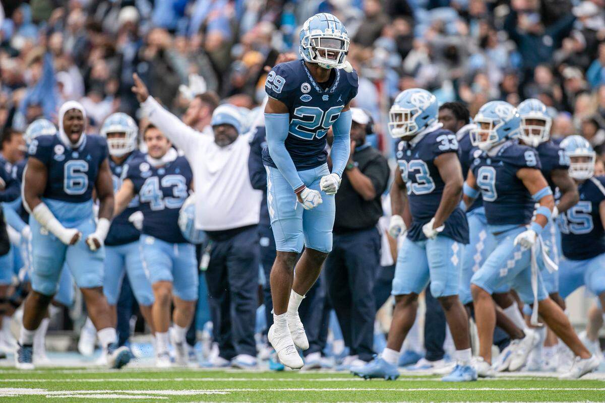 North Carolina’s Storm Duck (29) reacts after breaking up a pass intended for Wake Forest’s A.T. Perry (9) on fourth down, turning the ball over to North Carolina and securing their victory on Saturday, November 6, 2021 at Kenan Stadium in Chapel Hill, N.C.