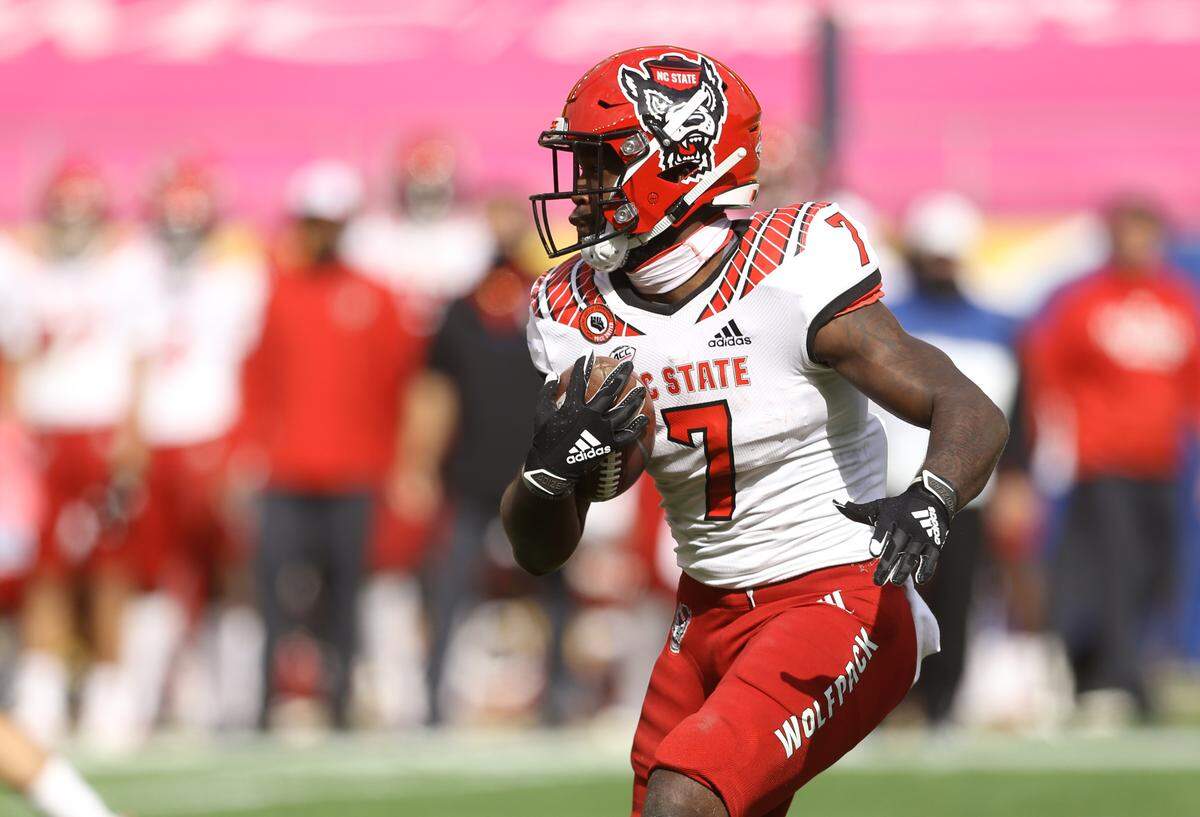 N.C. State’s Zonovan Knight (7) runs the ball during the Wolfpack’s game against the Pittsburgh Panthers at Heinz Field in Pittsburgh, PA, Saturday, Oct. 3, 2020.
