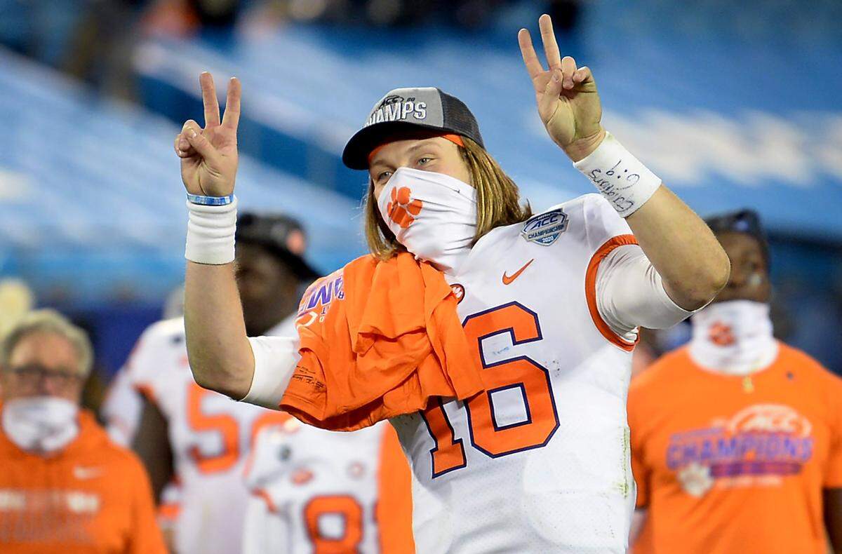 Clemson Tigers quarterback Trevor Lawrence jokes around following the teamÕs victory over Notre Dame in the ACC Championship game at Bank of America Stadium in Charlotte, NC on Saturday, December 19, 2020. The Tigers defeated the Fighting Irish 34-10.
