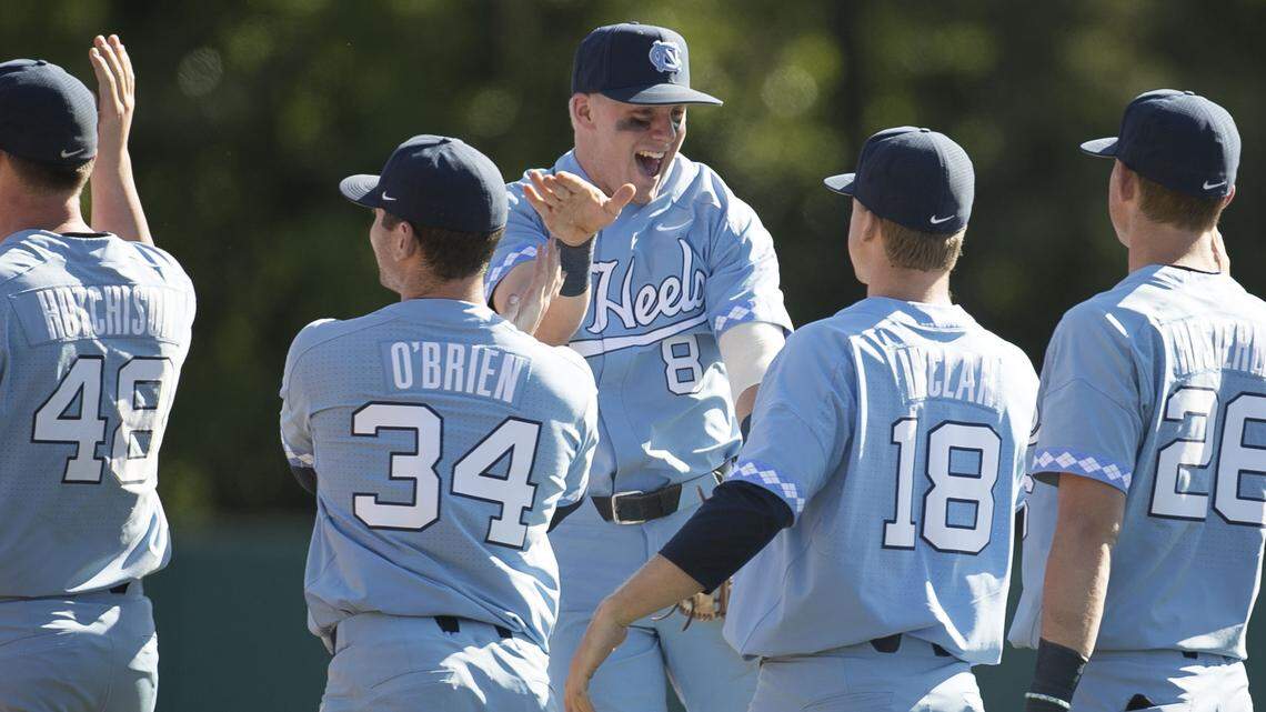 North Carolina’s Ike Freeman (8) celebrates with his teammates following their 5-4 victory over N.C. State, securing a three-game series sweep on Sunday, April 29, 2018, at Doak Field in Raleigh, N.C.