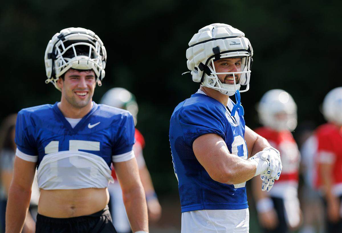 Duke’s Nicky Dalmolin, right, smiles during practice at Brooks Practice Field on Wednesday, July 31, 2024, in Durham, N.C.