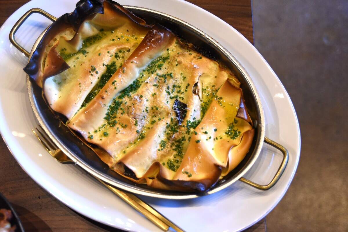 Jjajiang, a two-sheet lasagna dish stuffed with black bean and minced pork and baked with a bechamel sauce is on the opening menu of the new M Hansik in Durham.