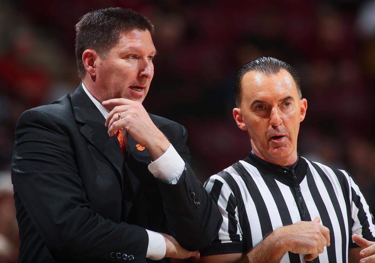 Clemson head coach Brad Brownell chats with official Roger Ayers in the second half of an NCAA college basketball game against Florida State on Wednesday, Feb. 14, 2018, in Tallahassee, Fla. Florida State won 81-79 in overtime. (AP Photo/Phil Sears)