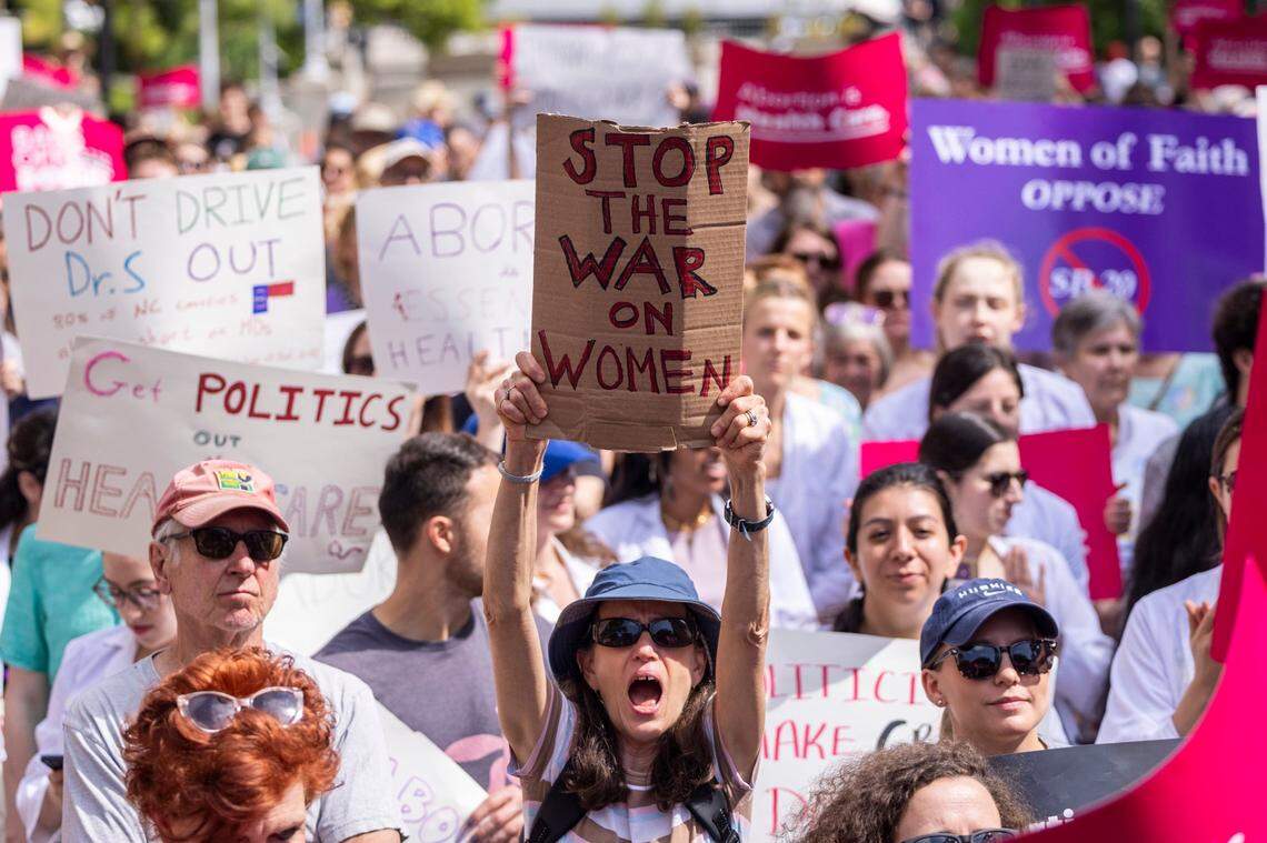 Hundreds of abortion ban veto supporters turned out to watch Gov. Roy Cooper sign a veto of the on Bicentennial Mall in Raleigh Saturday, May 13, 2023.