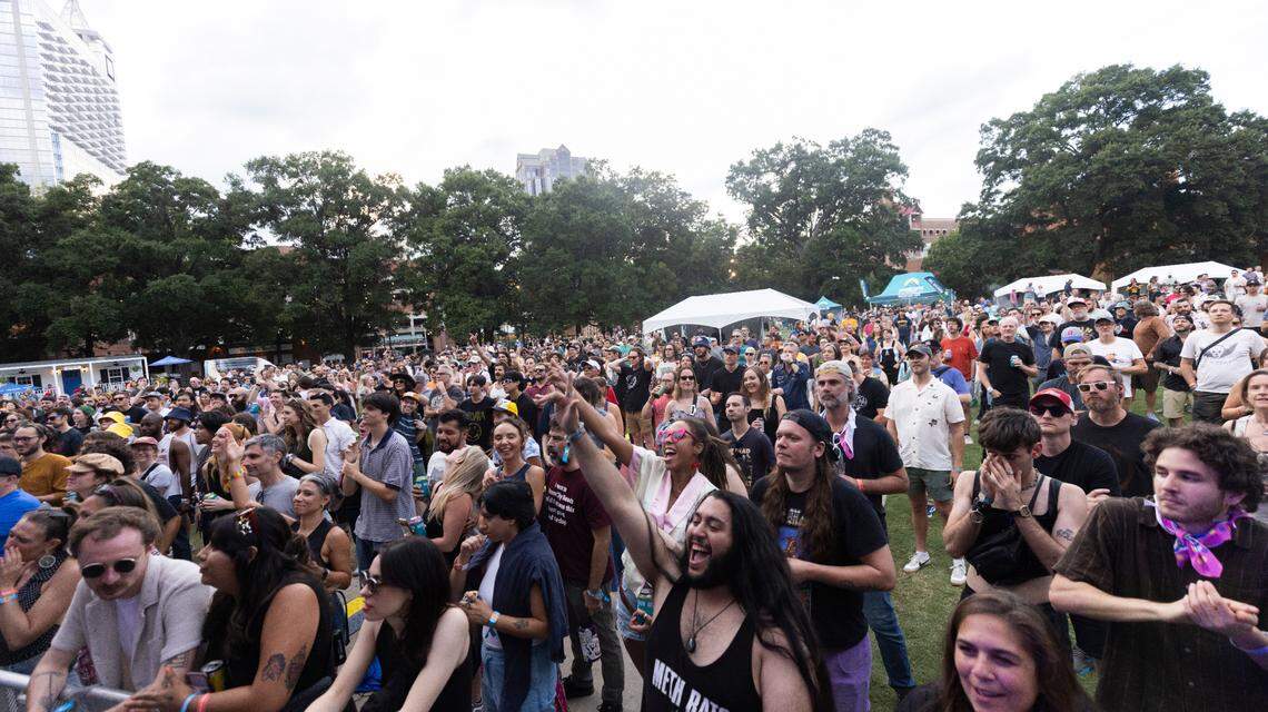 Concert-goers watch Chicano Batman perform at Moore Square in Raleigh during the Hopscotch Music Festival on Friday, Sept. 6, 2024.