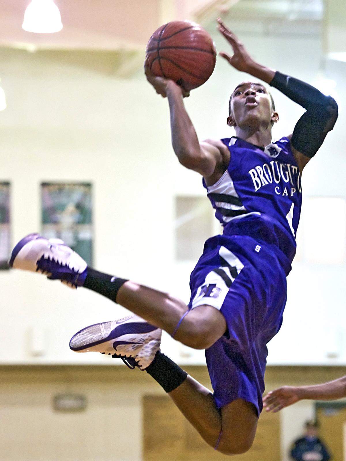 In 2012, then-Broughton junior Devonte' Graham (4) goes up for an acrobatic shot.