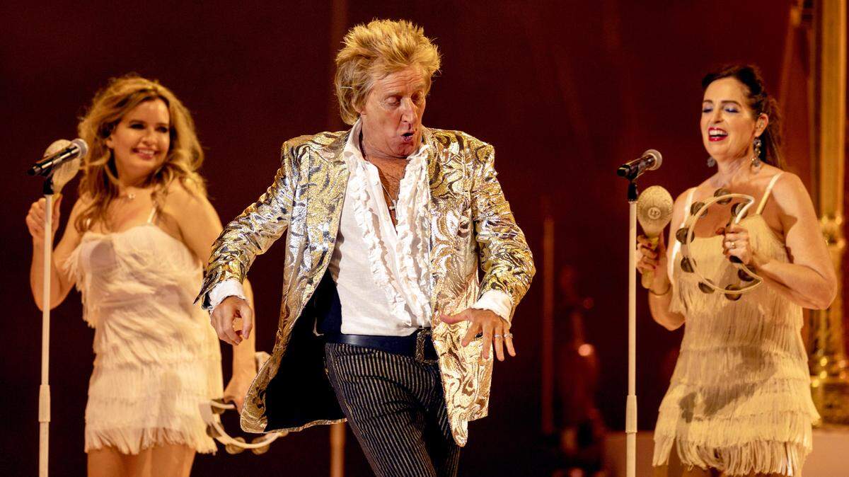 Rod Stewart dances across the stage during his “One Last Time” tour concert at Raleigh, N.C.’s Coastal Credit Union Music Park at Walnut Creek, Tuesday night, July 8, 2025.