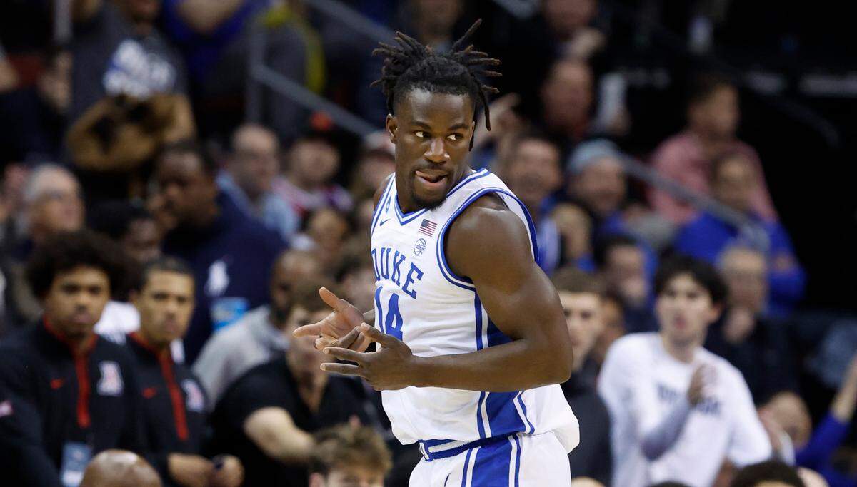 Duke’s Sion James (14) celebrates after hitting a three-pointer during the first half of Duke’s game against Arizona in the Sweet 16 round of the 2025 Men’s NCAA Basketball Championship at the Prudential Center in Newark, N.J., Thursday, March 27, 2025.