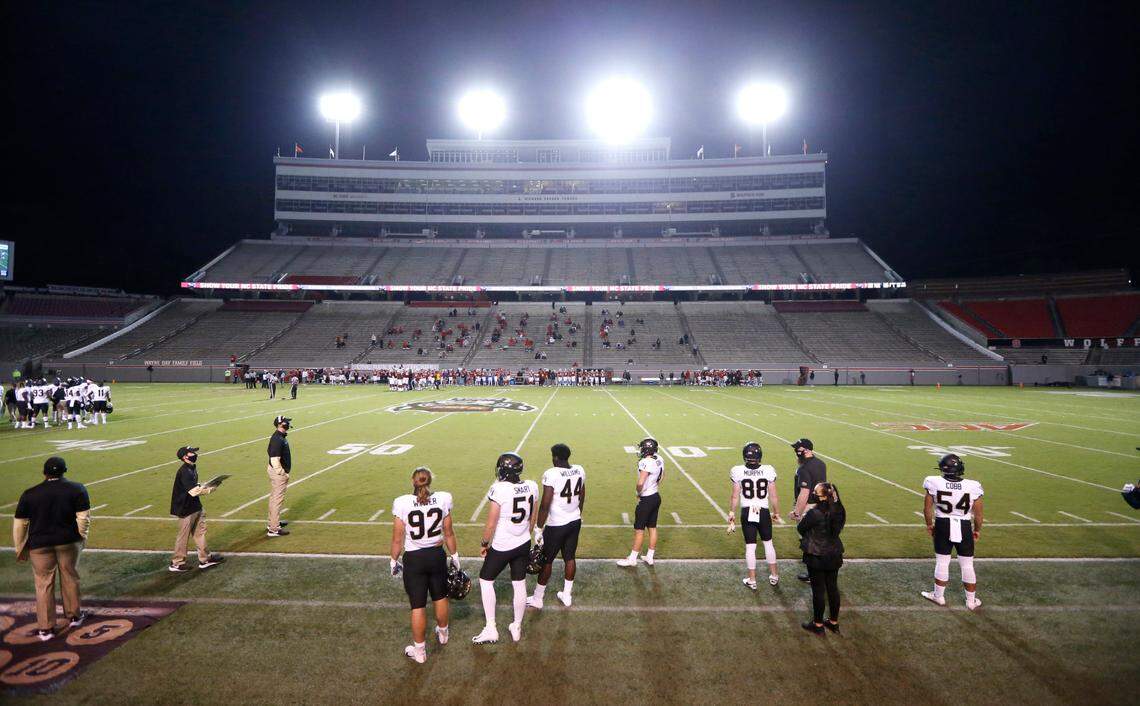 Football player family members watch during the second half of N.C. State’s 45-42 victory over Wake Forest at Carter-Finley Stadium in Raleigh, N.C, Saturday, Sept. 19, 2020.