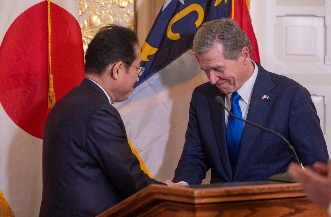 North Carolina Governor Roy Cooper welcomes Japanese Prime Minister Fumio Kishida to the dais for remarks prior to their luncheon on Friday, April 12, 2024 at the Executive Mansion in Raleigh, N.C.