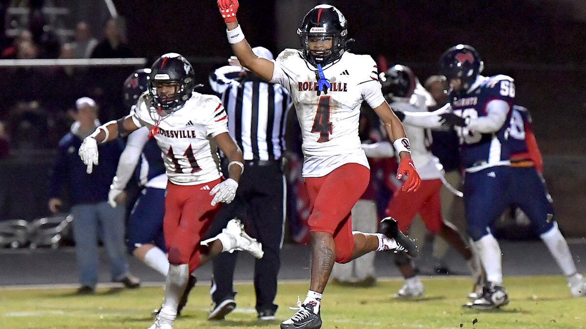 Rolesville defensive back Derion Newborn (4) celebrates victory after their stop of Apex Friendship in overtime. The Apex Friendship Patriots and the Rolesville Rams met in the second round of the  NCHSAA 8A Playoff game in Apex, N.C. on November 14, 2025. Rolesville wins 14-7 in overtime.