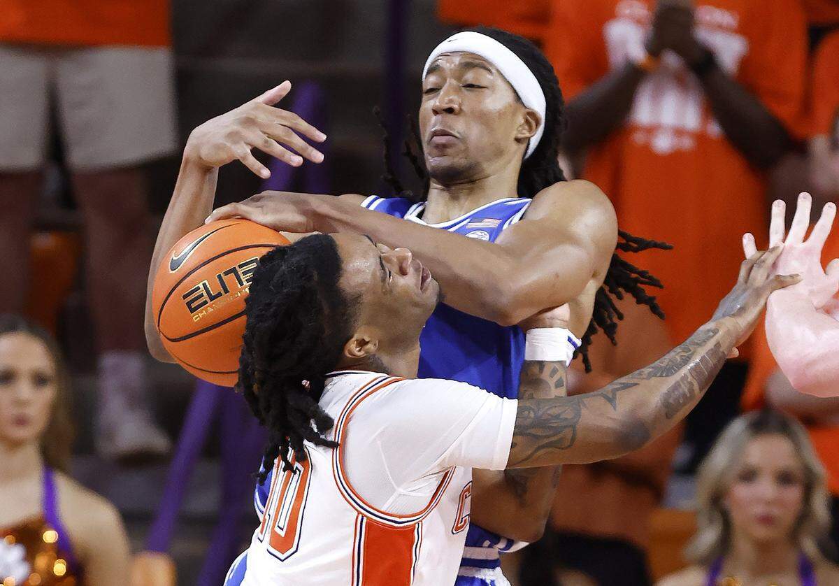 Duke’s Maliq Brown (6) fouls Clemson’s Del Jones (10) as he tries to steal the ball during the first half of Duke’s game against Clemson at Littlejohn Coliseum in Clemson, S.C., Saturday, Feb. 8, 2025.