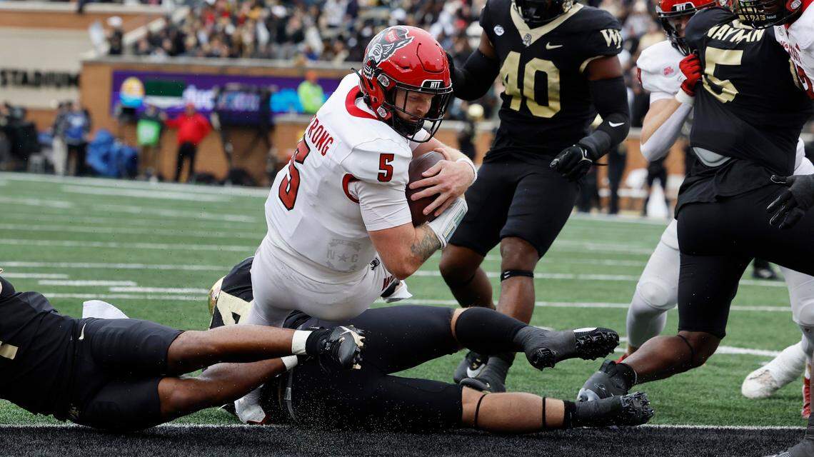 N.C. State quarterback Brennan Armstrong (5) dives in for a touchdown during the first half of N.C. State’s game against Wake Forest at Allegacy Stadium in Winston-Salem, N.C., Saturday, Nov. 11, 2023.