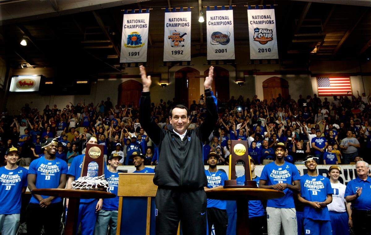 Coach Mike Krzyzewski center, starts to dance during a welcome home celebration in Durham. The Duke Blue Devils basketball team returned to campus heroes on Tuesday, April 7, 2015 after winning the NCAA National Championship in Indianapolis the night before against the Wisconsin Badgers. Students and fans packed Cameron Indoor Stadium in Durham to celebrate the team’s fifth national championship.