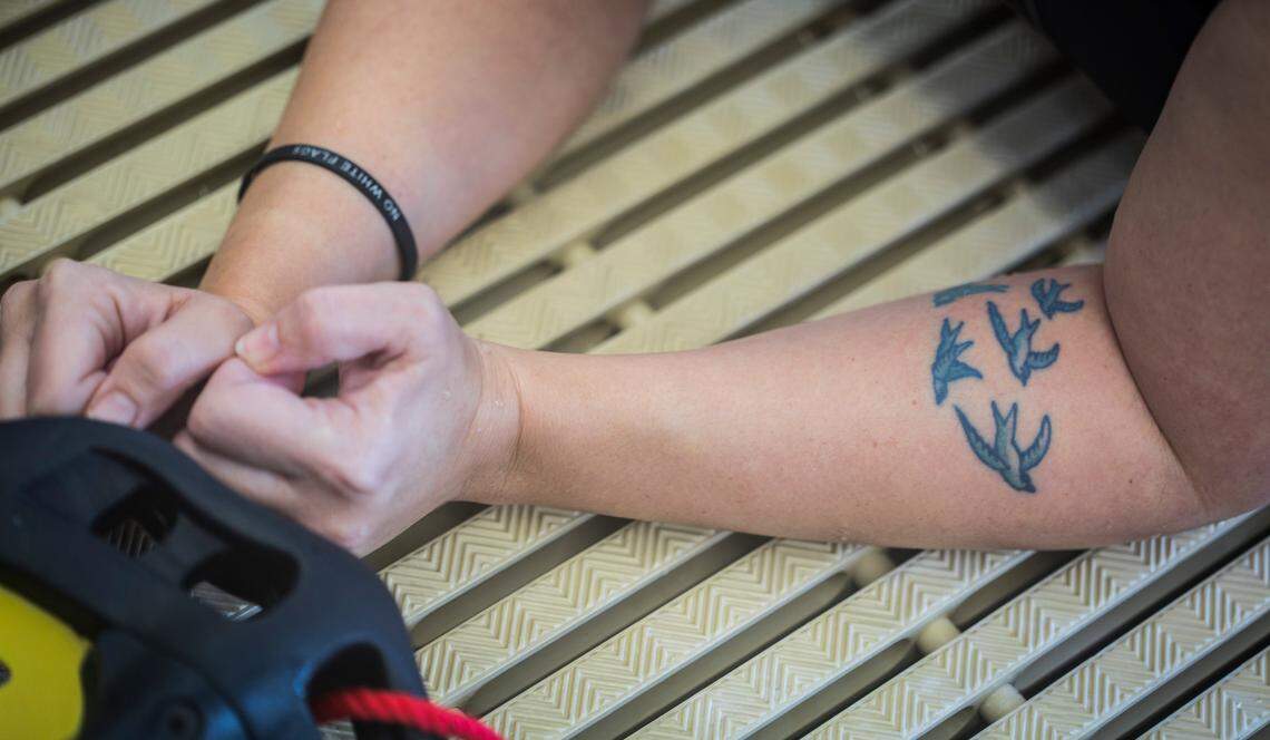 Andrea Peet, pictured here on Feb. 17, 2020 at Life Time Fitness in Cary, N.C., gets a new swallow tattooed on her arm for each additional year that she is able to live with her ALS diagnosis. “Swallows are a symbol of hope in the ALS community,” said Peet.
