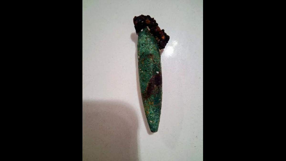 A tourist looking for shark’s teeth on a North Carolina beach stumbled onto something when this sliver of steel appeared in the sand. It’s believed to be a bullet linked to WWII training missions off the state’s coast.