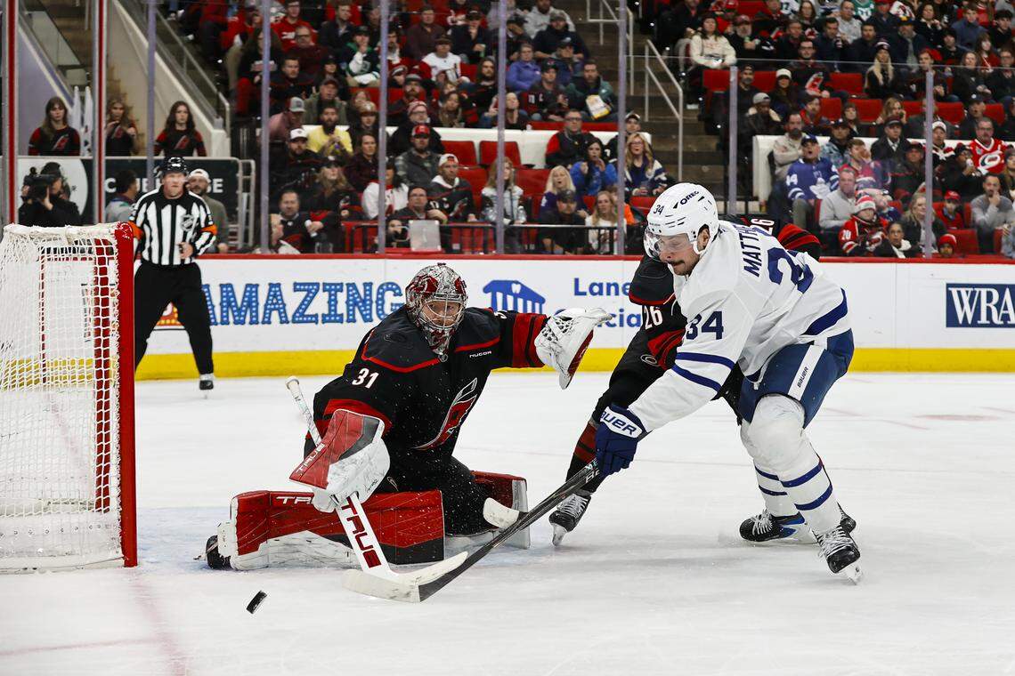 Goalie Frederik Andersen of the Carolina Hurricanes blocks a shot from Auston Matthews of the Toronto Maple Leafs during the first period at Lenovo Center on Dec. 4, 2025 in Raleigh, North Carolina.
