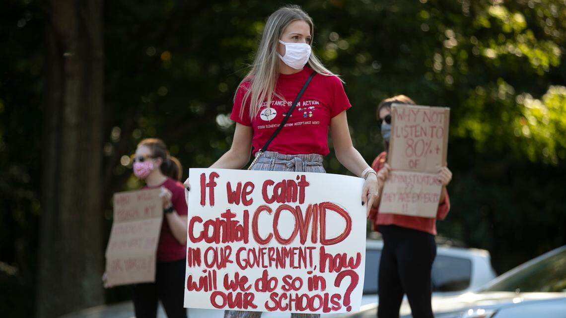 Sarah Suchoski joined forty other educators to demonstrate against Wake County’s proposed reopening of schools for in-person learning outside the Wake County Public Schools’ building on Dillard Drive in Cary, N.C. on Tuesday, October 6, 2020.