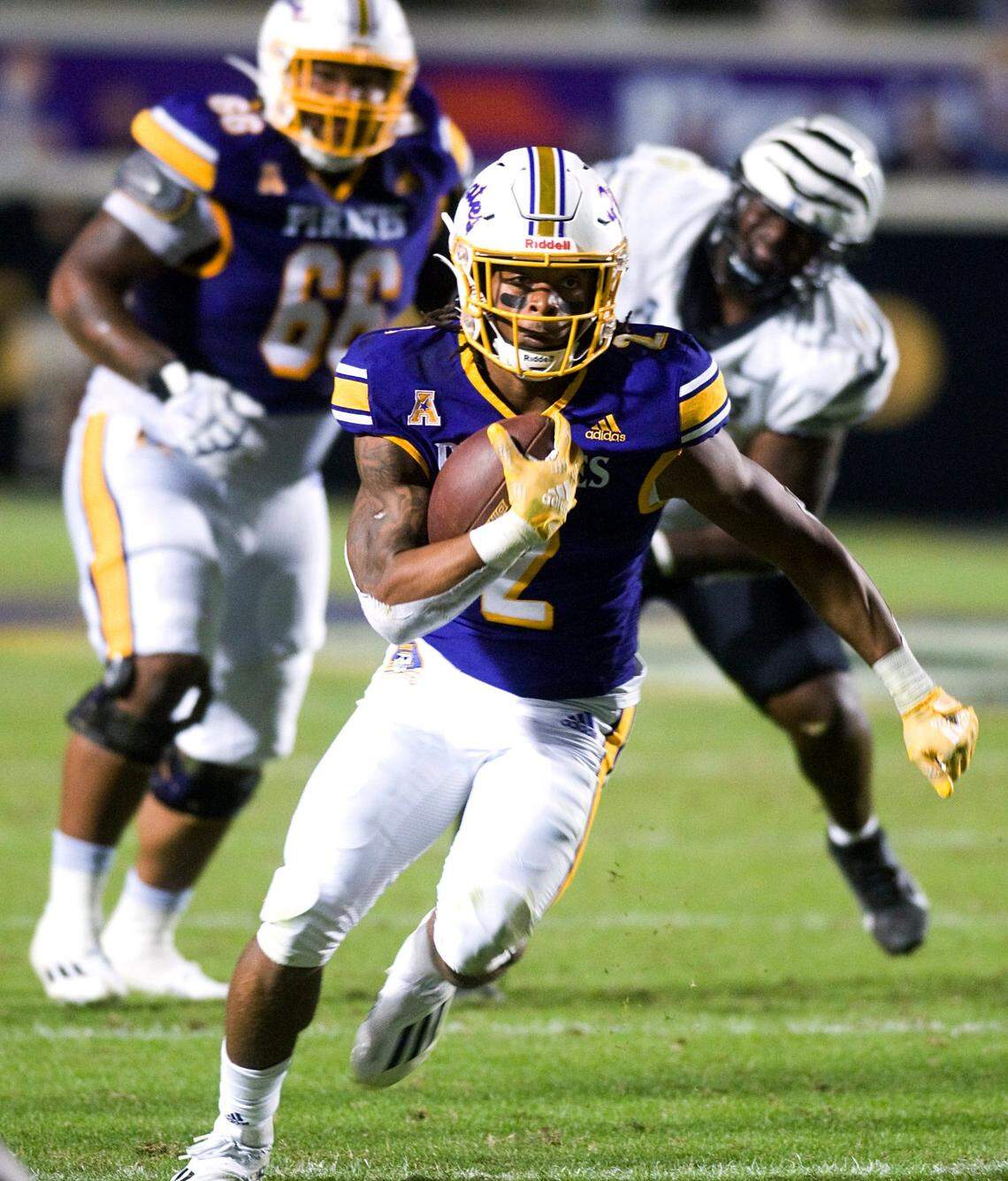 East Carolina’s Keaton Mitchell runs the ball against Memphis during an NCAA college football game Saturday, Oct. 15, 2022, in Greenville, N.C.