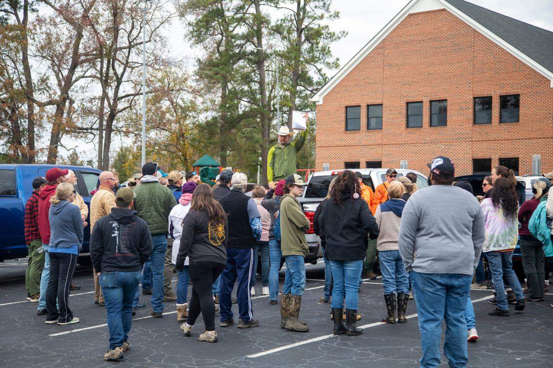 A volunteer search party in Wendell prepares to dispatch Tuesday, Nov. 15, 2022 after 9-year-old Bentley Stancil went missing for more than 24 hours. Stancil was found safe, hiding in a camper.