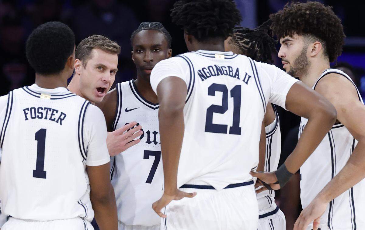 Duke head coach Jon Scheyer talks to the team after Dame Sarr was called for a technical in the first half of Duke’s game against Texas Tech in the SentinelOne Classic at Madison Square Garden in New York City, N.Y., Saturday, Dec. 20, 2025.
