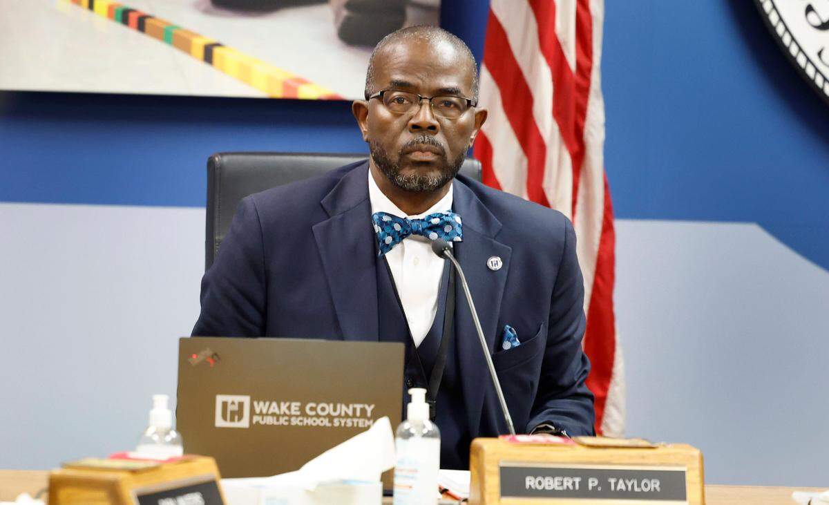 Wake County School Superintendent Robert Taylor listens at the start of the Wake County School Board Safety and Security meeting in Cary, N.C., Tuesday, Nov. 28, 2023. 