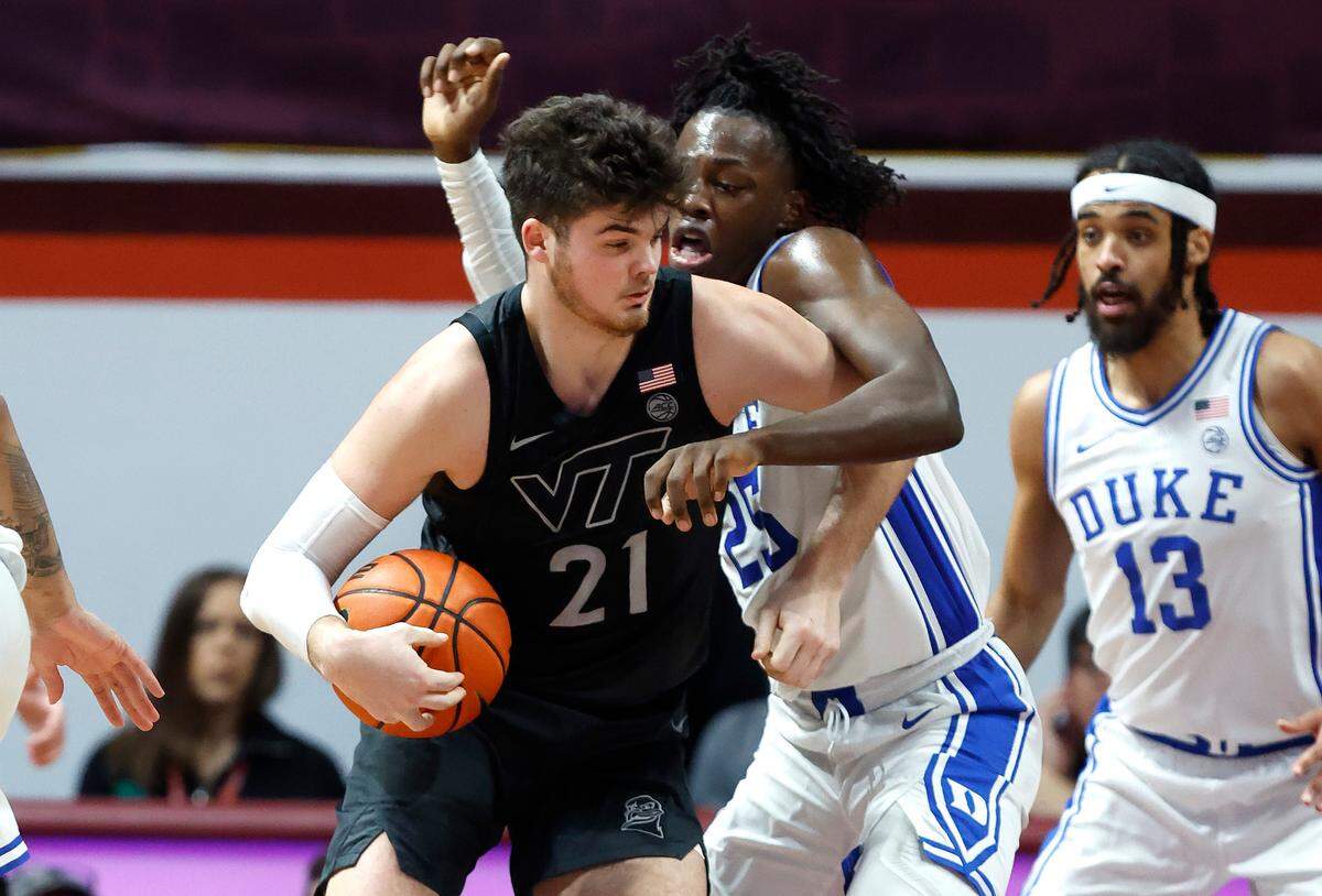 Duke’s Mark Mitchell (25) defends Virginia Tech’s Grant Basile (21) during the second half of Virginia Tech’s 78-75 victory over Duke at Cassell Coliseum in Blacksburg, VA., Monday, Jan. 23, 2023.