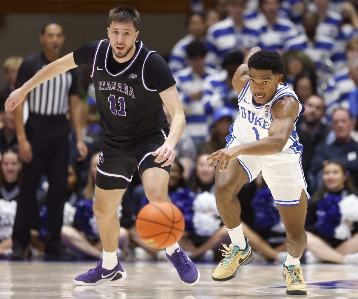 Duke’s Caleb Foster chases after a loose ball after forcing a turnover from Niagara’s Vice Zanki during the second half of the Blue Devils’ 100-42 win on Friday, Nov. 21, 2025, at Cameron Indoor Stadium in Durham, N.C.