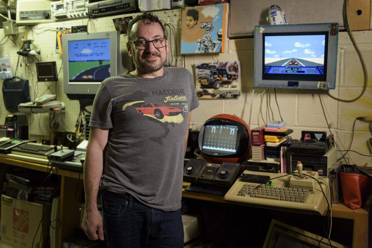 Car expert Jason Torchinsky poses for a portrait in his office in Chapel Hill, NC. Torchinsky is a senior editor at Jalopnik.com where he writes about unique cars and the future of driving. He’s also an inveterate tinkerer, with more than 50 years of resurrected technology piled on various desks, tables and shelves.