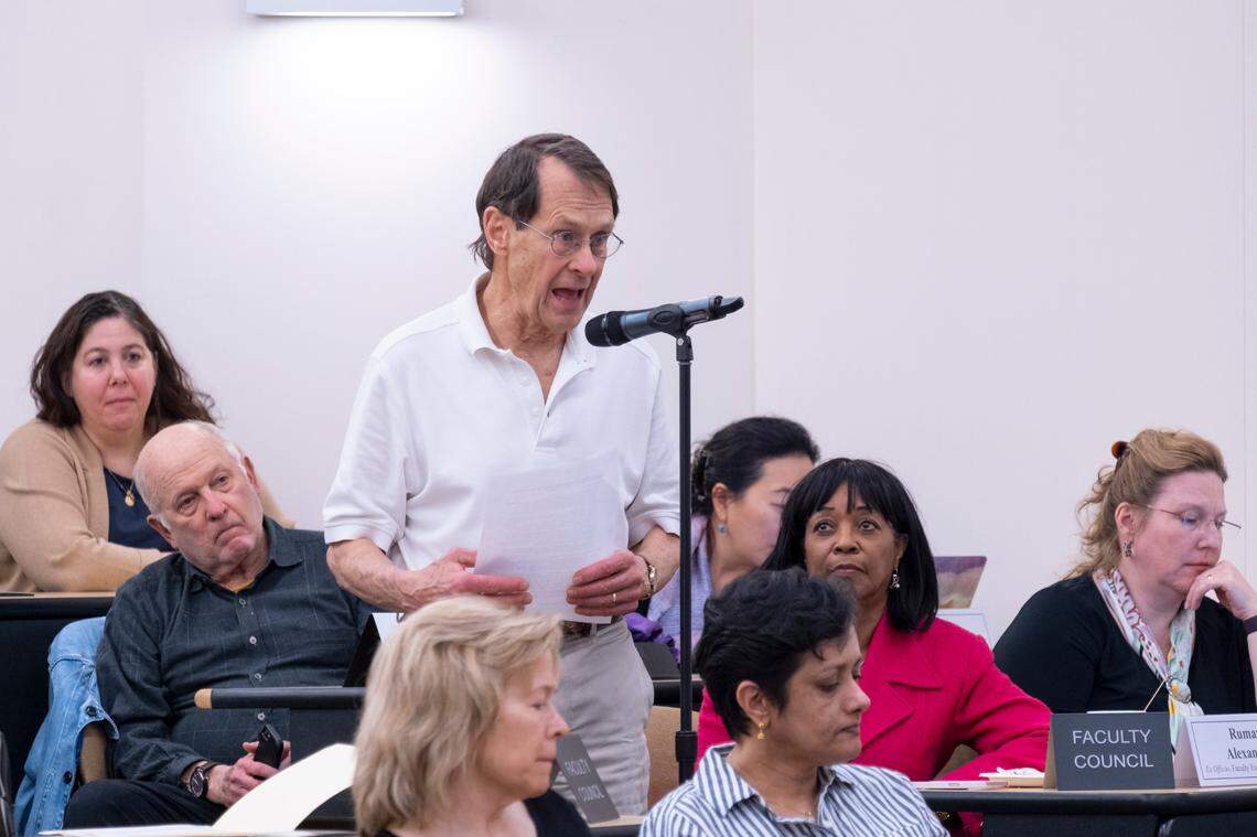 UNC history professor Harry Watson reads his resolution regarding a new school proposal during the UNC Faculty Council meeting held in at the Gillings School of Global Public Health on the campus of the University of North Carolina at Chapel Hill. February 17, 2023.