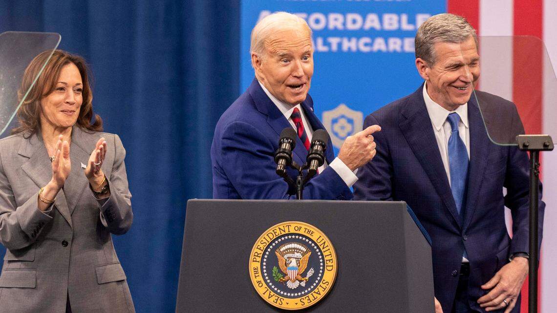 Democrats in North Carolina say Mecklenburg County could be key in turning the state blue for the first time in 16 years. In this file photo, Vice President Kamala Harris, President Joe Biden and Gov. Roy Cooper join one another on stage after speeches on heath care during a campaign stop at the Chavis Community Center in Raleigh on Tuesday, March 26, 2024.