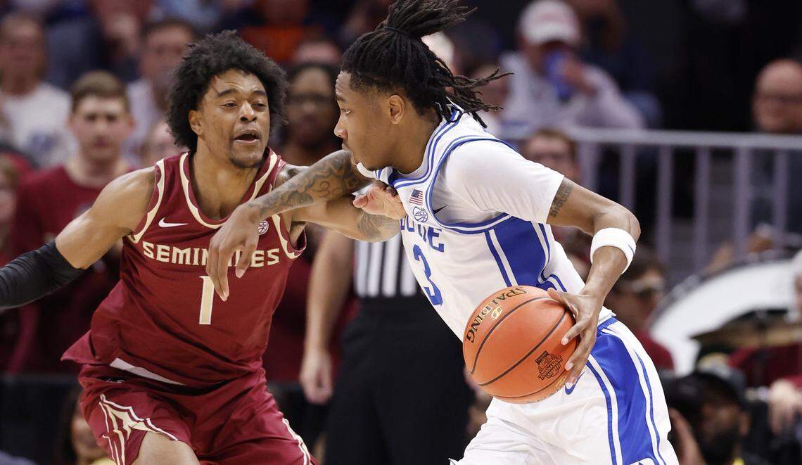 Duke’s Isaiah Evans (3) drives by Florida State's Martin Somerville (1) during the first half of Duke’s game against Florida State in the quarterfinals of the 2026 ACC Men’s Basketball Tournament at the Spectrum Center in Charlotte, N.C., Thursday, March 12, 2026.