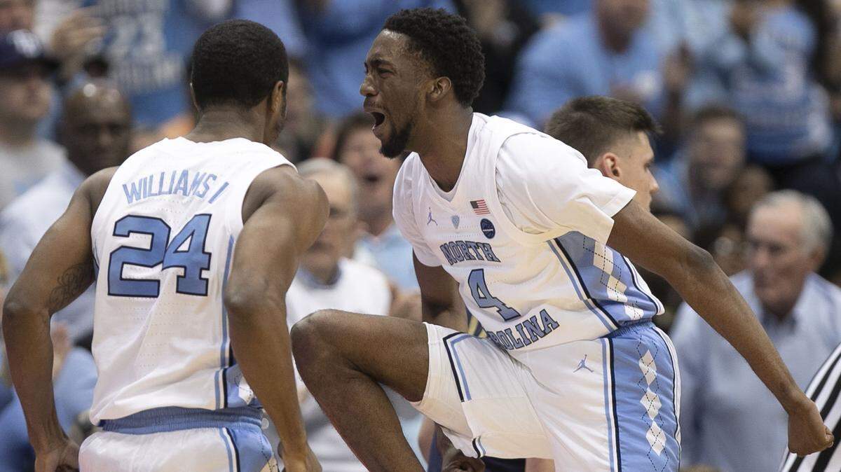 North Carolina’s Brandon Robinson (4) reacts after forcing Notre Dame to call a timeout during the closing minutes of the second half on Tuesday, January 15, 2019 at the Smith Center in Chapel Hill, N.C.
