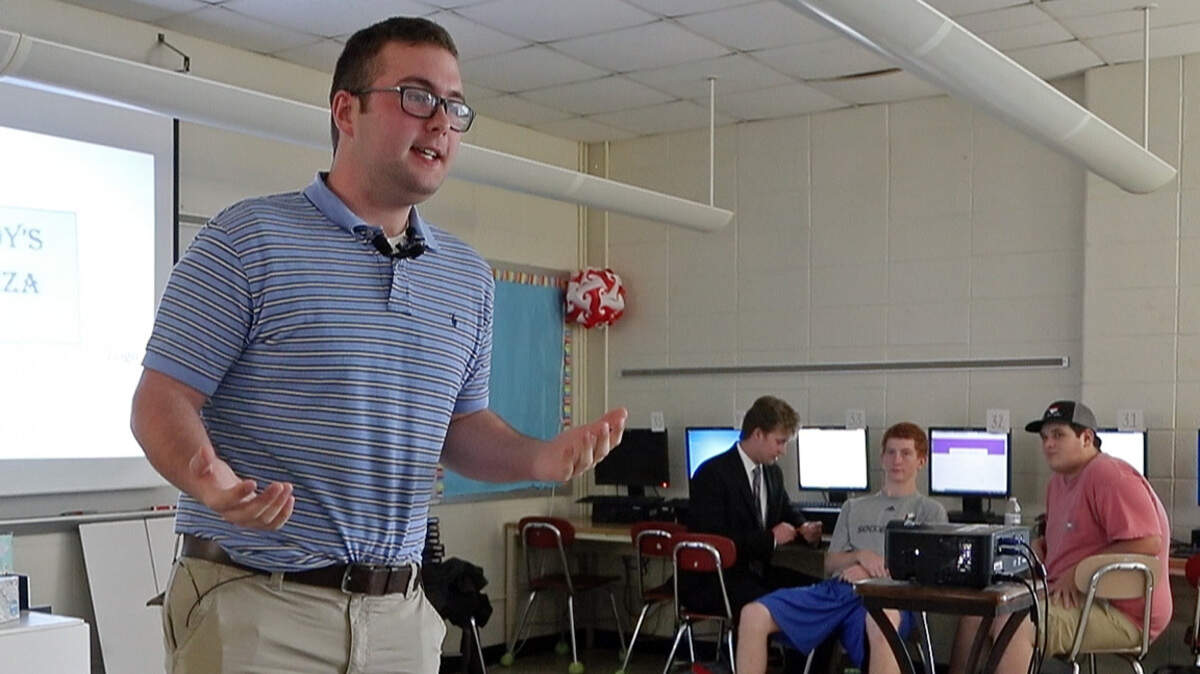 Sanderson High School senior Cody Ellison makes a pitch for a hypothetical pizza restaurant during a business class at the school in Raleigh n May 30, 2018.  Wake County school leaders say they may have to take steps such as raising class sizes and reducing the number of classes offered to students in order to close a $23.9 million budget gap.