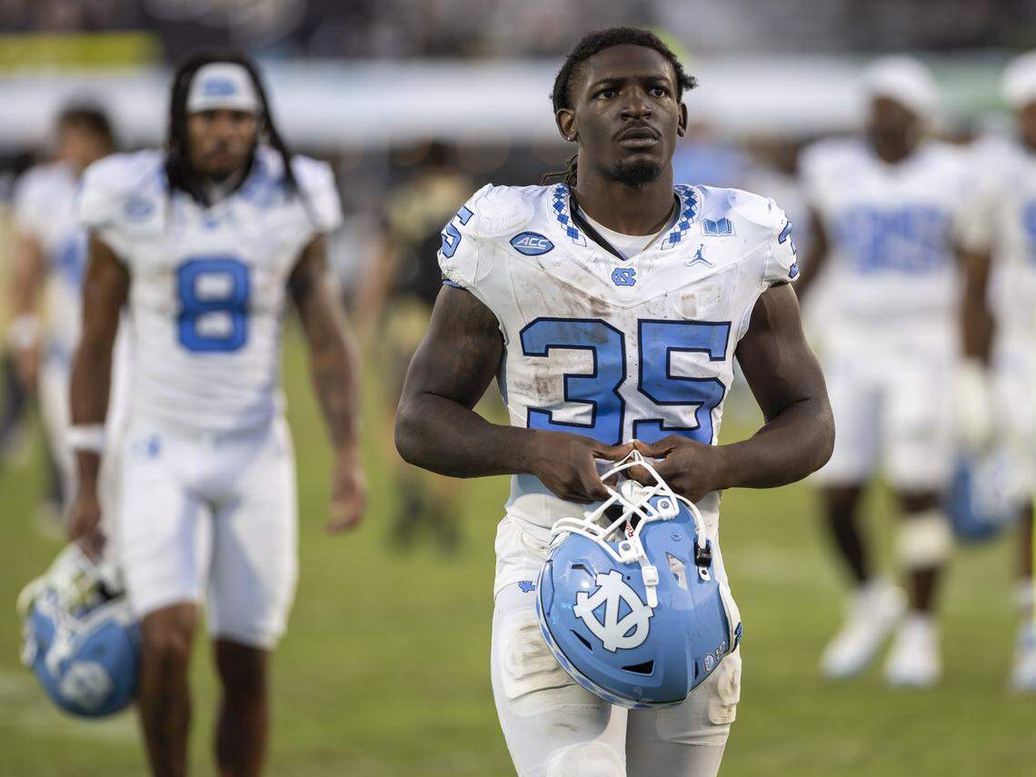 North Carolina running back Demon June (35) leaves the field following the Tar Heels’ 34-9 loss to UCF on Saturday, September 20, 2025 at Acrisure Bounce House Stadium in Orlando, Fla. June was held to 50 yards rushing in the loss. 