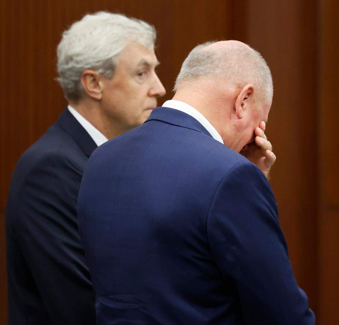 Alan Thompson wipes tears from his eyes while appearing in court Wednesday, Sept. 25, 2024. Thompson, the father of the accused Hedingham mass shooter, pleaded guilty to a misdemeanor charge of storing a firearm with a minor’s unsafe access. Thompson lost his son James in the Oct. 13, 2022 shooting spree in which his younger son Austin, then 15, is charged with killing five people and injuring two others. Thompson’s attorney, Roger Smith, stands to the left.