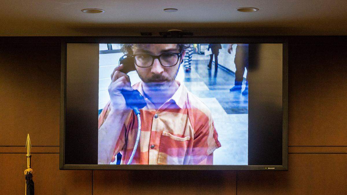Andrew Thomas Graney makes his first appearance in court via a video feed before District Court Judge Debra Sasser at the Wake County Justice Center on Friday, Nov. 8, 2024. Graney, 23, a senior majoring in anthropology at NC State University, was charged with felony assault and discharging a firearm into an occupied vehicle or dwelling.