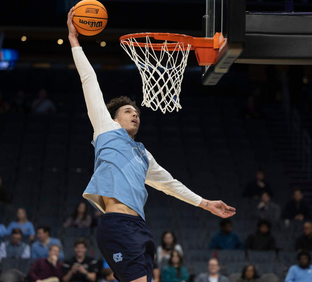 North Carolina’s Zayden High (1) dunks during practice on Wednesday, March 20, 2024 as the Tar Heels prepare for the NCAA Tournament at Spectrum Center in Charlotte, N.C.