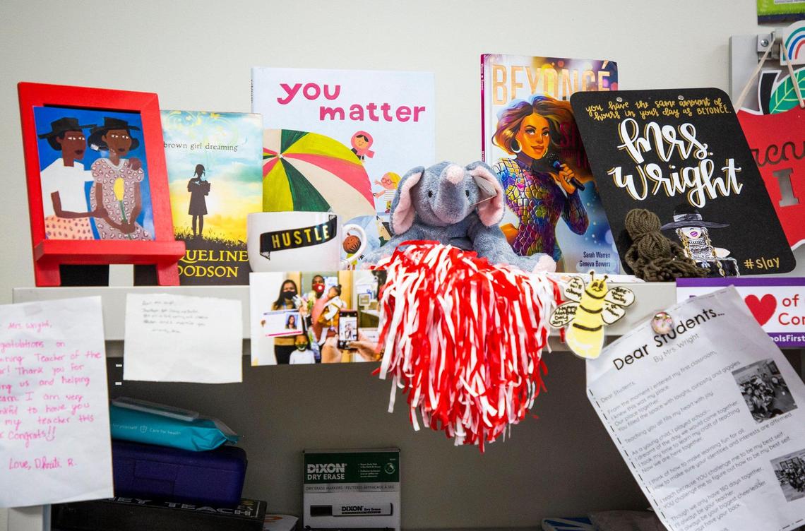 A cabinet is decorated with Bria Wright’s books, notes, and photos in her second grade classroom at Hortons Creek Elementary School, on Thursday, May 6, 2021, in Cary, N.C.