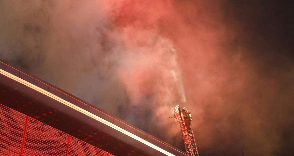 Firefighters battle a blaze at the Raleigh Convention Center in downtown Raleigh, N.C., Monday evening, Dec. 1, 2025.