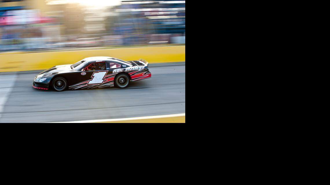 Race cars thunder through the Wake County Speedway, which is hidden away south of Raleigh, on Fridays throughout the summer. Drivers compete with several classes of cars, ranging from slower mini-stocks to swarms of speeding late models. 
